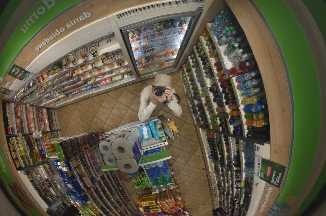 store detective catching thief