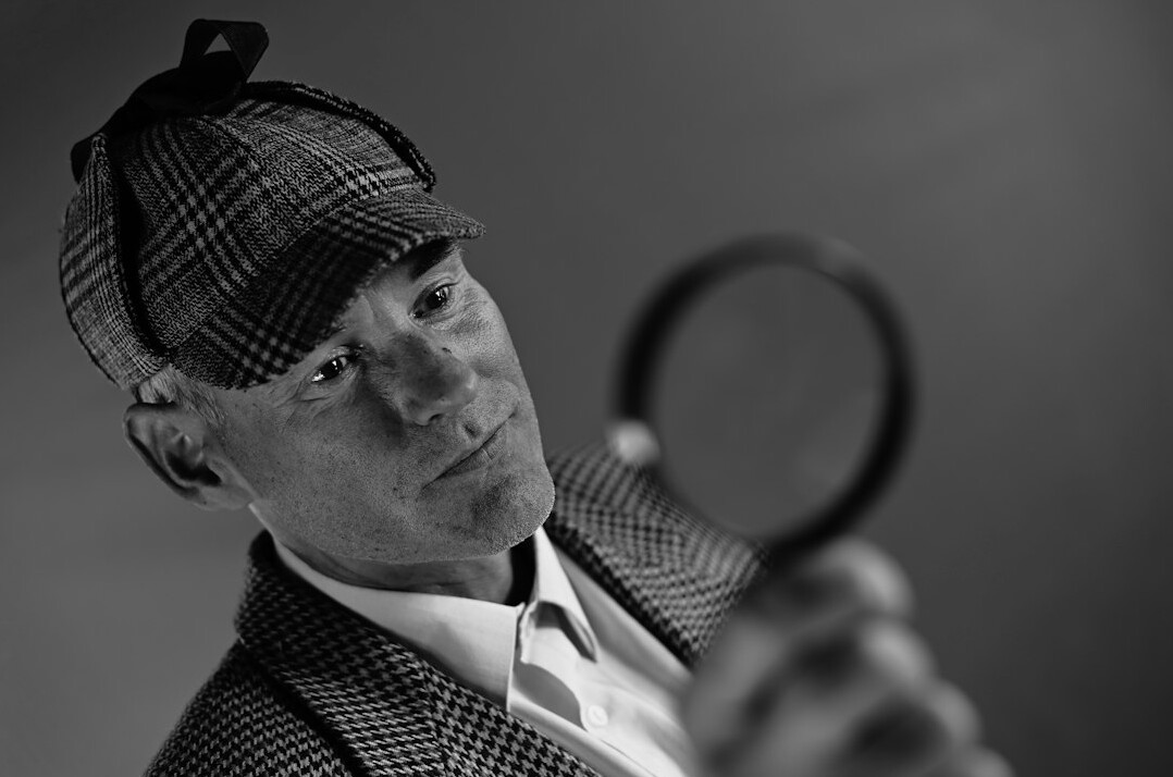 detective reviewing footage